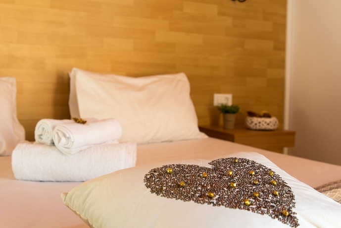 Imagen de la habitación del Hotel Ampelia Seaside Resort. Foto 19