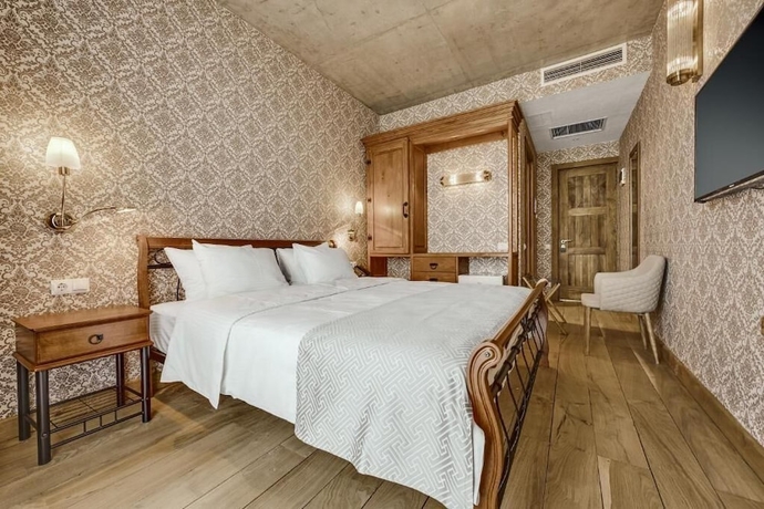 Imagen de la habitación del Hotel Ampelo Resort. Foto 7