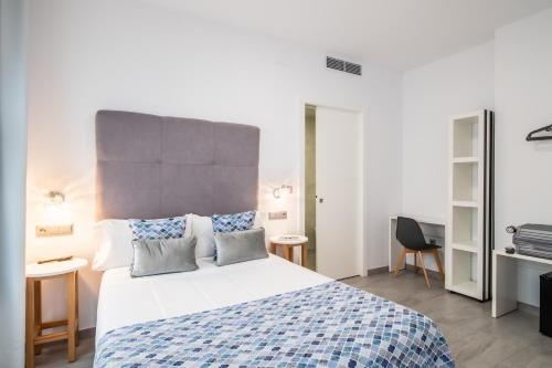 Imagen de la habitación del Hotel Amphora Alojamiento. Foto 2