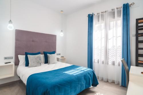 Imagen de la habitación del Hotel Amphora Alojamiento. Foto 5