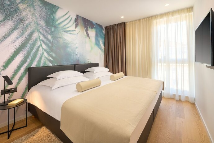 Imagen de la habitación del Hotel Amphora\'s Garden. Foto 18