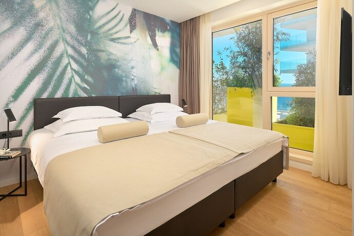 Imagen de la habitación del Hotel Amphora\'s Garden. Foto 19