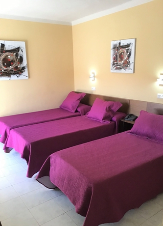 Imagen de la habitación del Hotel Ampuria Inn. Foto 12