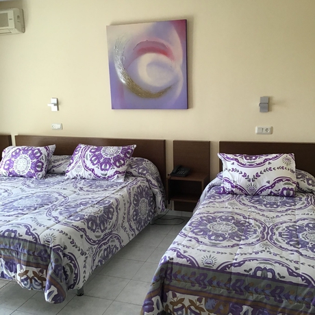 Imagen de la habitación del Hotel Ampuria Inn. Foto 13