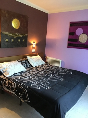 Imagen de la habitación del Hotel Ampuria Inn. Foto 15