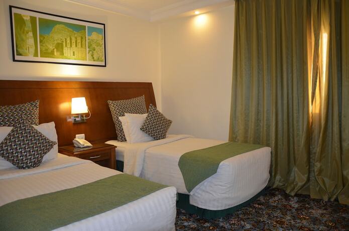 Imagen de la habitación del Hotel Amra Palace International. Foto 14