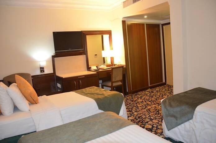 Imagen de la habitación del Hotel Amra Palace International. Foto 16