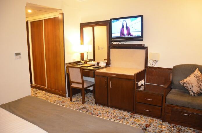 Imagen de la habitación del Hotel Amra Palace International. Foto 18