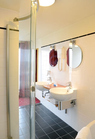 Imagen de la habitación del Hotel Amrâth Grand De L'empereur. Foto 13