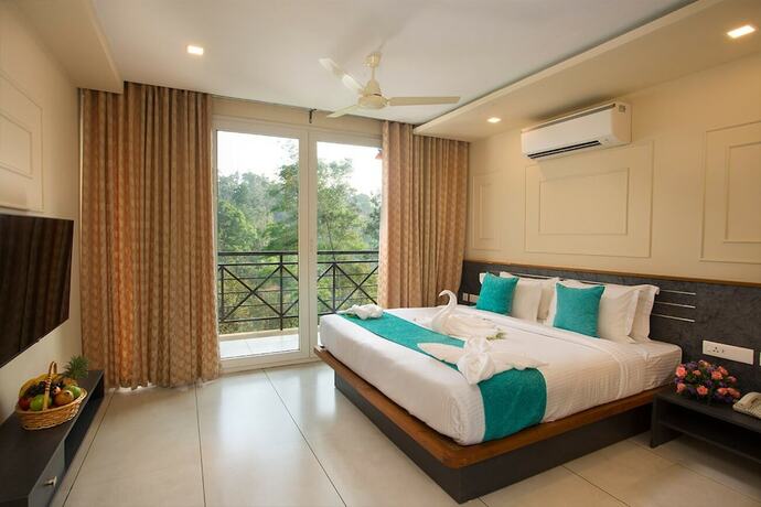 Imagen de la habitación del Hotel Amrezy Resort and Spa by Stride Wayanad. Foto 18