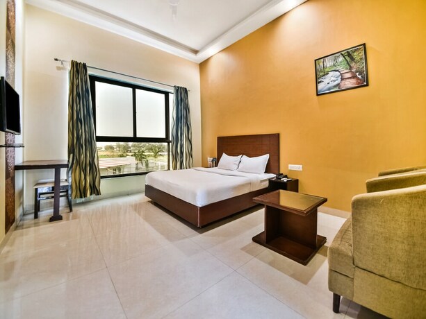 Imagen de la habitación del Hotel Amrit Manthan. Foto 28
