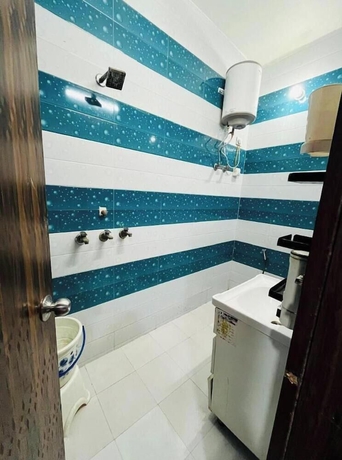 Imagen de la habitación del Hotel Amrit Residency, Mathura. Foto 16