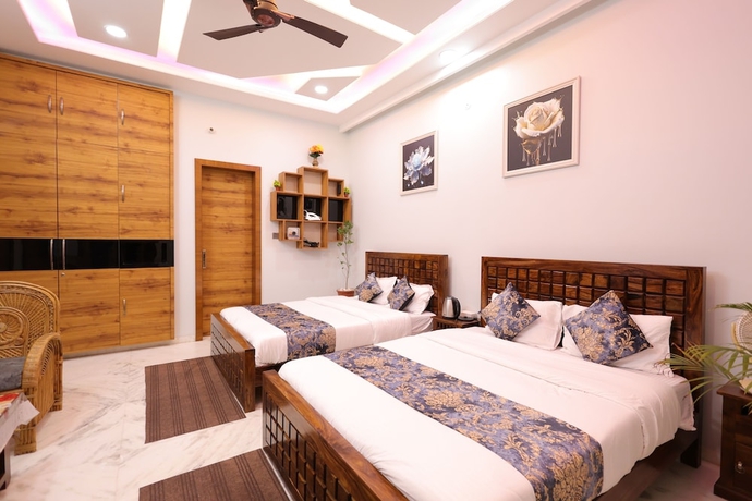 Imagen de la habitación del Hotel Amritam Palace A Luxury AC Home Stay. Foto 2