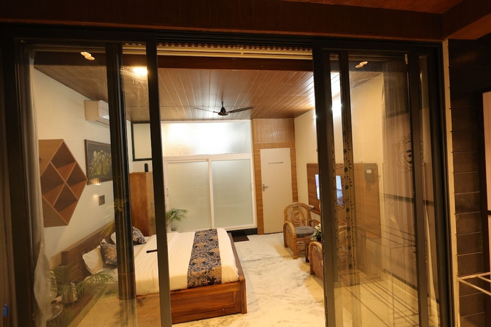 Imagen de la habitación del Hotel Amritam Palace A Luxury AC Home Stay. Foto 13