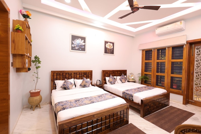 Imagen de la habitación del Hotel Amritam Palace A Luxury AC Home Stay. Foto 15