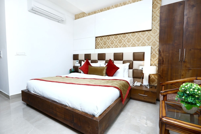 Imagen de la habitación del Hotel Amritsar Grand. Foto 4