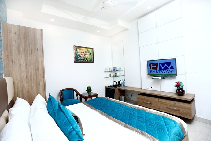Imagen de la habitación del Hotel Amritsar Grand. Foto 5