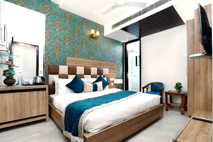 Imagen de la habitación del Hotel Amritsar Grand. Foto 8