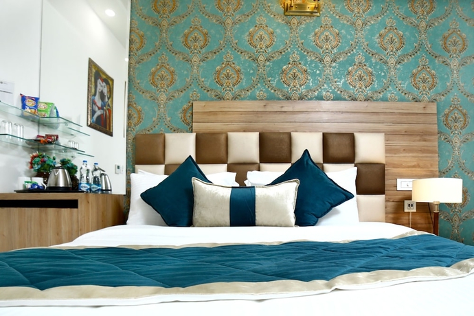Imagen de la habitación del Hotel Amritsar Grand. Foto 9