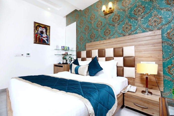 Imagen de la habitación del Hotel Amritsar Grand. Foto 10