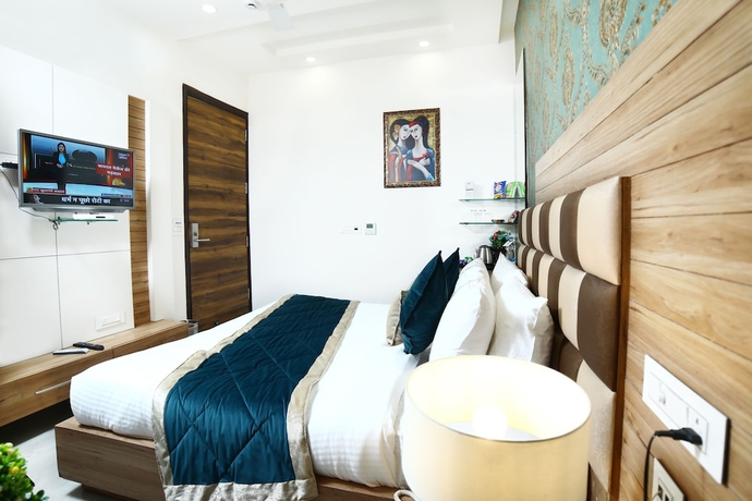 Imagen de la habitación del Hotel Amritsar Grand. Foto 11