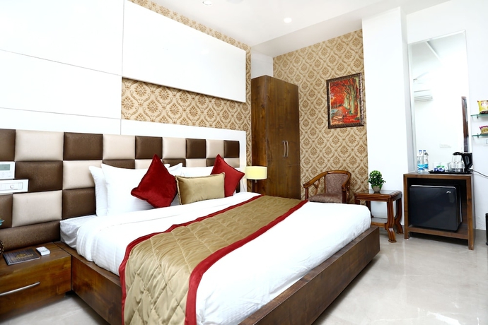 Imagen de la habitación del Hotel Amritsar Grand. Foto 12