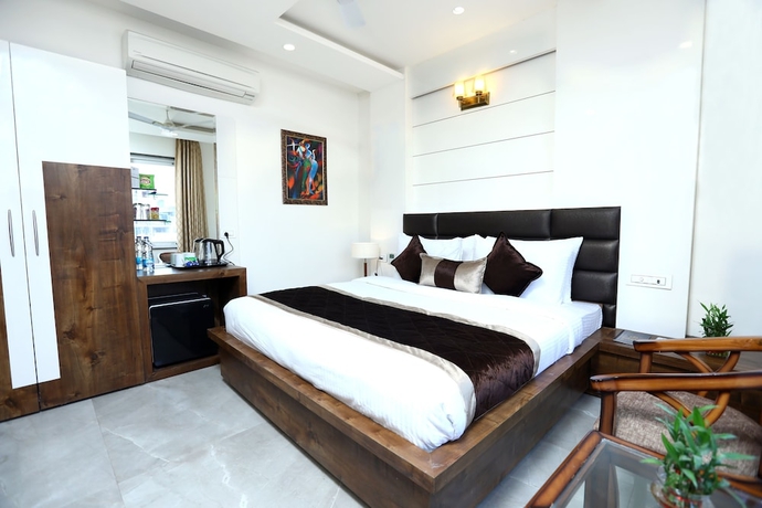 Imagen de la habitación del Hotel Amritsar Grand. Foto 15