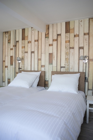 Imagen de la habitación del Hotel Amsterdam Beach Hotel. Foto 11