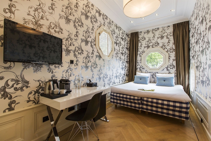 Imagen de la habitación del Hotel Amsterdam Canal Hotel. Foto 6