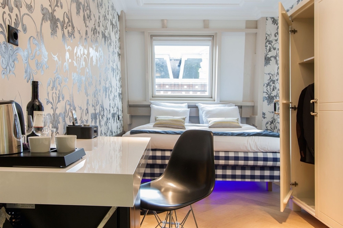 Imagen de la habitación del Hotel Amsterdam Canal Hotel. Foto 13