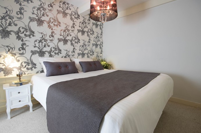 Imagen de la habitación del Hotel Amsterdam Canal Suites. Foto 4