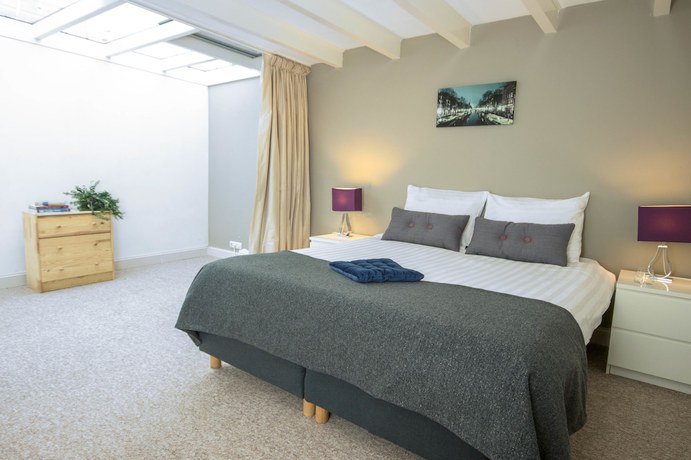 Imagen de la habitación del Hotel Amsterdam Canal Suites. Foto 6