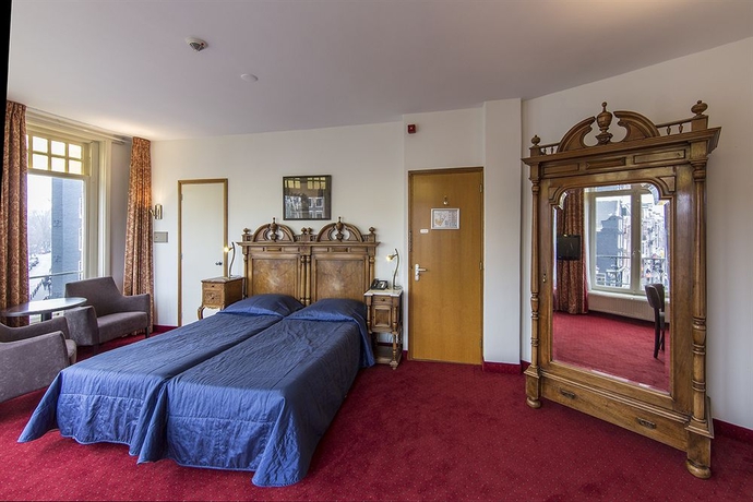 Imagen de la habitación del Hotel Amsterdam Wiechmann. Foto 11