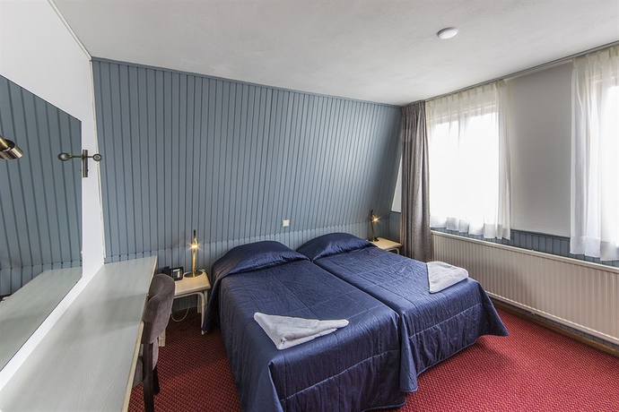 Imagen de la habitación del Hotel Amsterdam Wiechmann. Foto 12