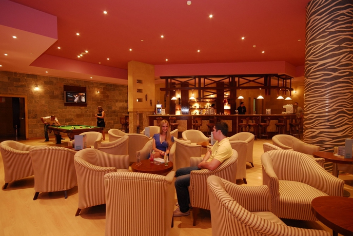 Imagen del bar/restaurante del Hotel Amwaj Oyoun Resort and Casino. Foto 7