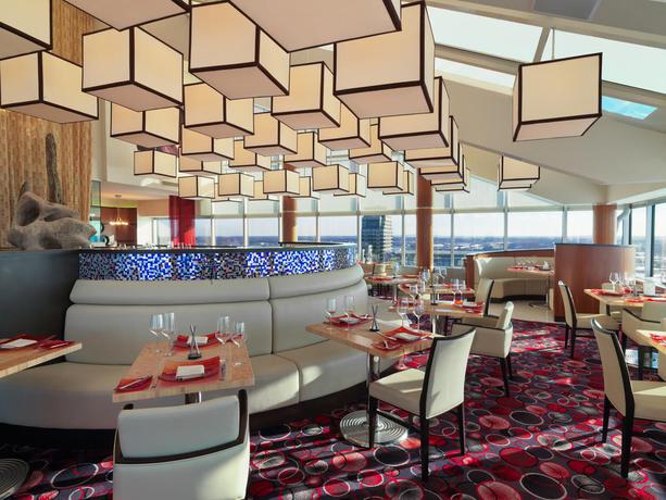 Imagen del bar/restaurante del Hotel Amway Grand Plaza, Curio Collection By Hilton. Foto 3