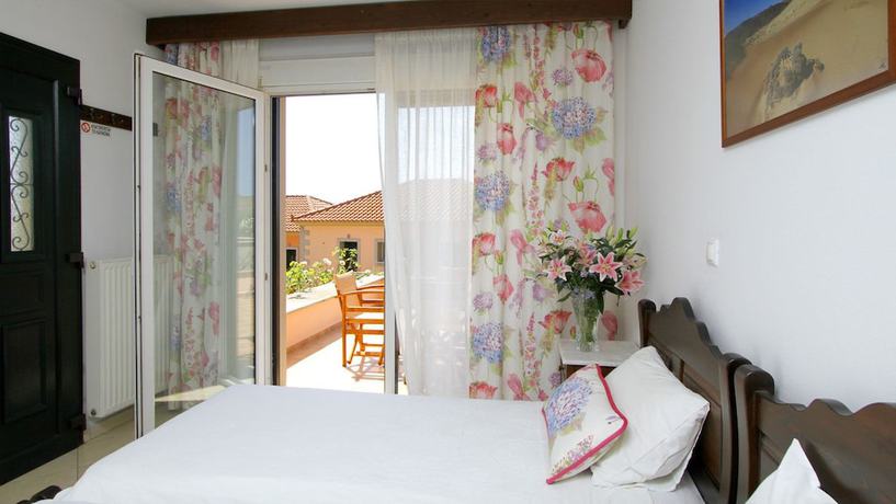 Imagen de la habitación del Hotel Amygdalies Apartments. Foto 13