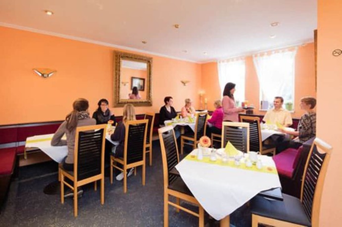 Imagen del bar/restaurante del Hotel An Der Stadtmauer, M&uuml;hlhausen. Foto 2