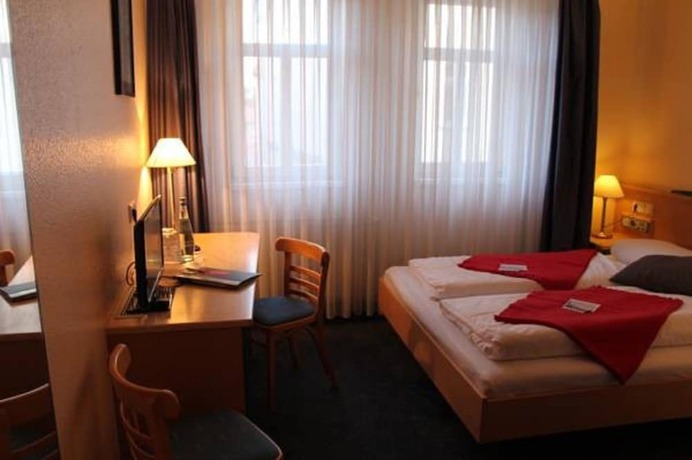 Imagen de la habitación del Hotel An Der Stadtmauer, M&uuml;hlhausen. Foto 10