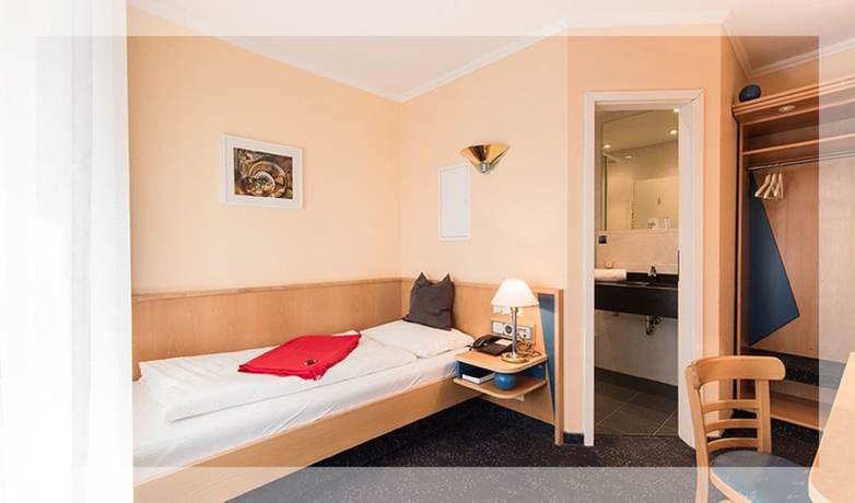 Imagen de la habitación del Hotel An Der Stadtmauer, M&uuml;hlhausen. Foto 16