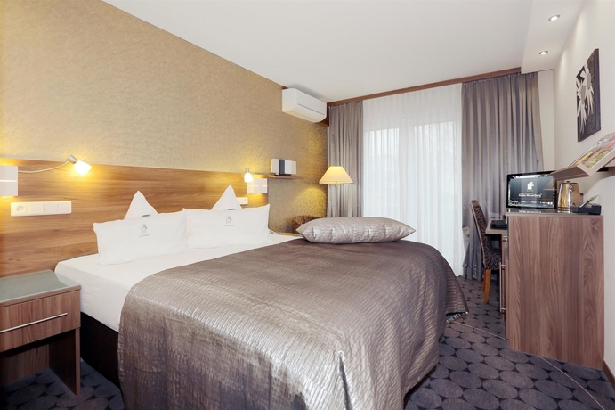 Imagen de la habitación del Hotel An Der Wasserburg - Wellness- Und Seminarhotel. Foto 13