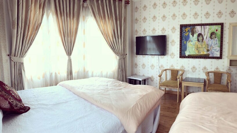 Imagen de la habitación del Hotel An Nhien Villa, Da Lat. Foto 23