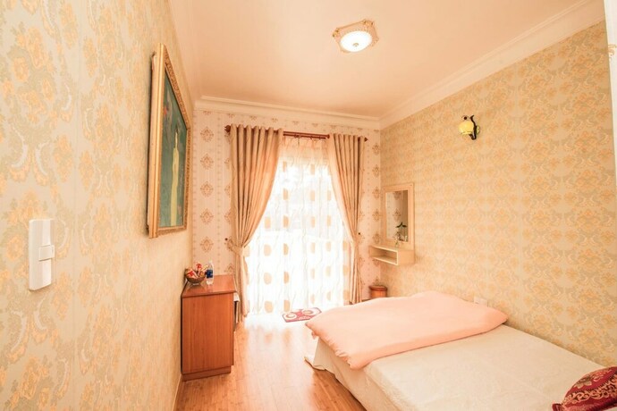 Imagen de la habitación del Hotel An Nhien Villa, Da Lat. Foto 25