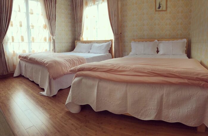 Imagen de la habitación del Hotel An Nhien Villa, Da Lat. Foto 33