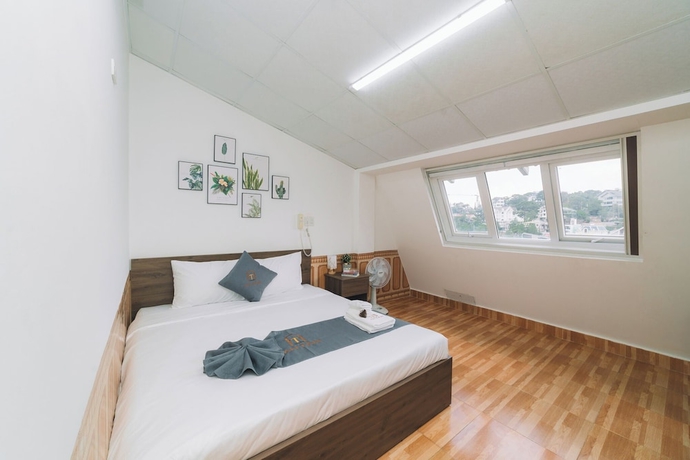 Imagen de la habitación del Hotel An Tam House DaLat. Foto 2