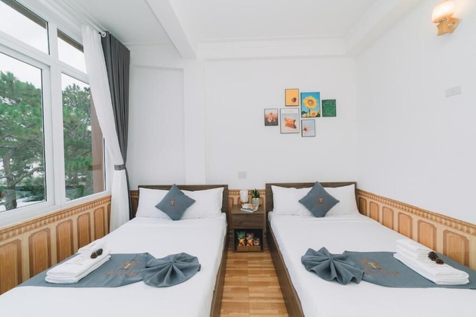 Imagen de la habitación del Hotel An Tam House DaLat. Foto 3