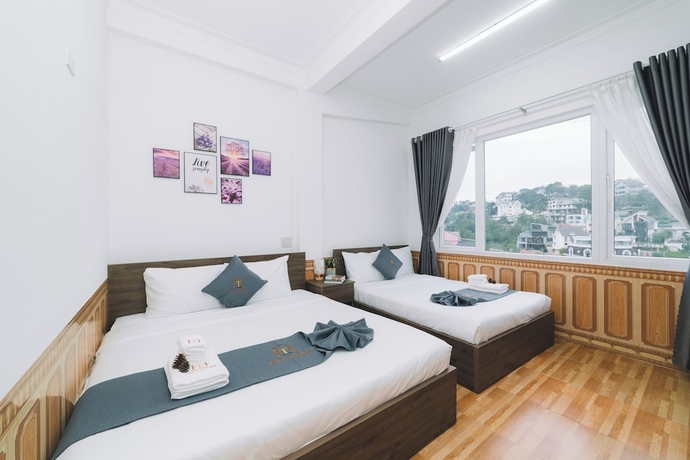 Imagen de la habitación del Hotel An Tam House DaLat. Foto 9