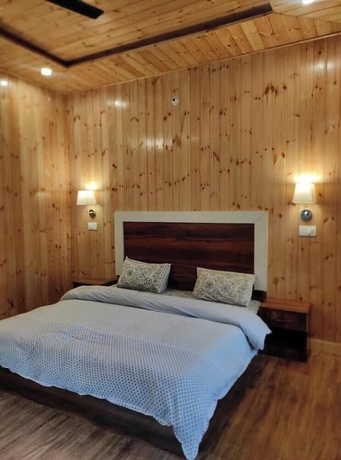 Imagen de la habitación del Hotel Anand-Ganga Yoga Guesthouse. Foto 10