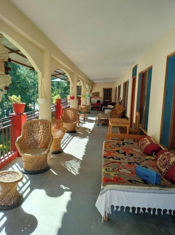 Imagen de la habitación del Hotel Anand-Ganga Yoga Guesthouse. Foto 13