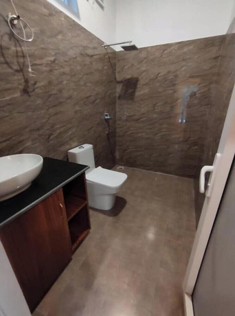 Imagen de la habitación del Hotel Anand-Ganga Yoga Guesthouse. Foto 15